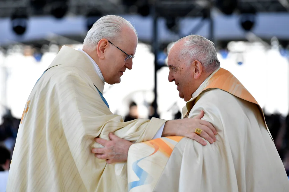 Pope Francis greeting archbishop of Budapest Cardinal Péter Erdő during a Mass at Kossuth Lajos Square on April 30, 2023, in Budapest, Hungary. | Source: Getty Images
