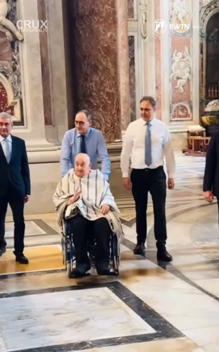Pope Francis waving at those around him during his surprise visit to St. Peter's Basilica, posted on April 11, 2025. | Source: Instagram/cruxstationalis